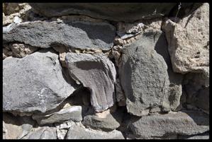 Wear marks from stone sitting in water at ports awaiting use as 