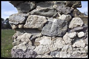 Wear marks from stone sitting in water at ports awaiting use as 