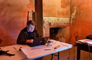 Carl Lounsbury studying the kitchen complex