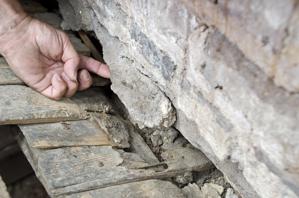 Original mortar used as flashing at the meeting of the roof and 