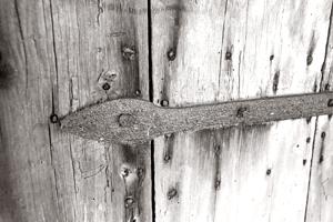 Built late 18th c; modiied in the 1830s; board and batten door w
