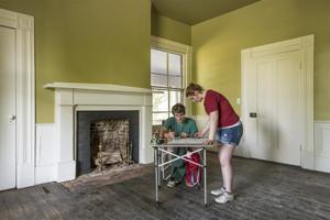 NIAHD William and Mary students measuring floor plan; 1856 wing 
