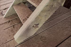 Through tenon and wedge detail on ladder stair