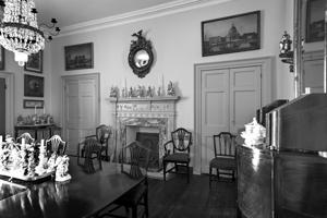 Dining room in wing; ornament added to mantel cast from those in
