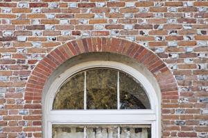 Signed brickwork over gauged and rubbed arch