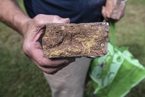 Imported red and yellow swirled brick recovered in the garden