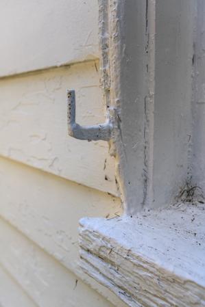 Dairy window and pintles from missing strap hinges and shutters