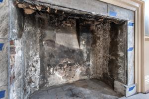 1st-floor firebox with evidence of Delft tile lining, 1774