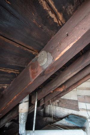 Slate samples nailed to rafters during each re-roofing