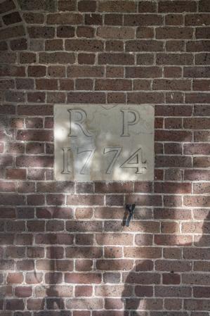 Date stone possibly renewed and moved