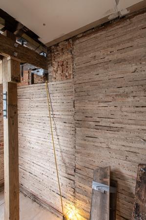Brick-nogged wall, second floor chamber over the hall, refitted 
