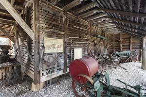 Walls pulled in and open sheds added to the 18th-century crib ab