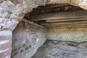 View through cleanout under floor of privy, ca. 1800
