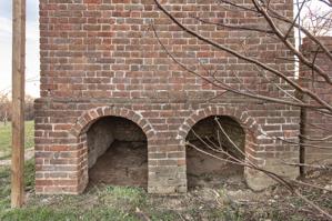 Clean outs on the rear of the privy, ca. 1800