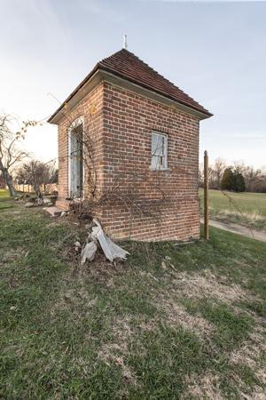 Privy set on the edge of the garden terraced