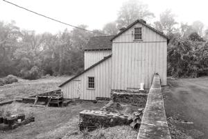 Timber frame bank barn with stone understory for animals, ca. 18