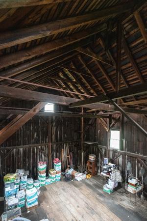 Timber frame bank barn with stone understory for animals, ca. 18