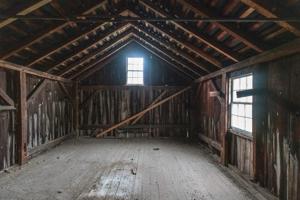 Timber frame bank barn with stone understory for animals, ca. 18