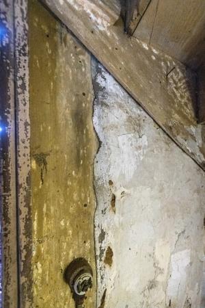 Plaster feathered intgo doorjamb of stairs; ca. 1820
