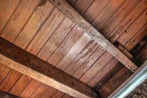 Floorboards handplaned underneath and marked
