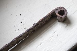 Hand-forged strap hinge with reverse eye