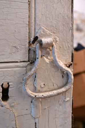 Hand-forged handle on wine vault door