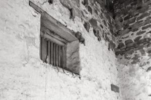 Window of earlier spring house, which now opens into the milk ho