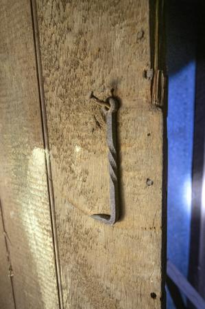 Sash-sawn door in cellar assembled with hand-forged nails
