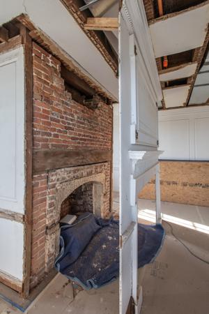 Large drawing room fireplacce of 1705 with wood lintel and 1729 