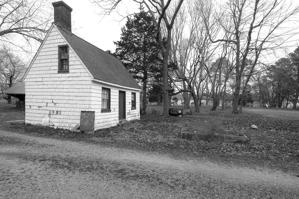 Buillt 1867 for aa Black woman caretaker; possibly earthfast