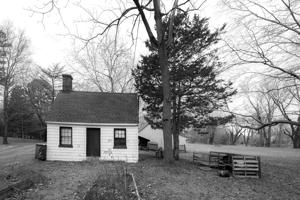 Buillt 1867 for aa Black woman caretaker; possibly earthfast