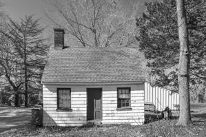 Buillt 1867 for aa Black woman caretaker; possibly earthfast