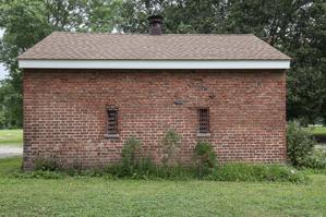 Flemish bond smokehouse dating to about 1800