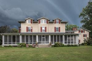 18th-century timber frame house remodeled in 1859