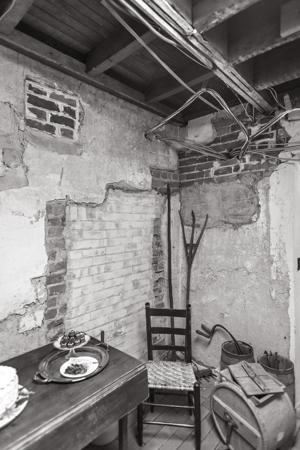 Ghost of original winder stairs to cellar, ca. 1812