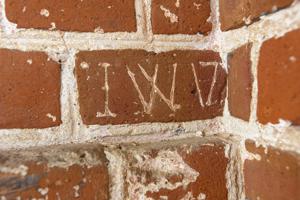 Date brick used on tower bonds to the main wall of the church