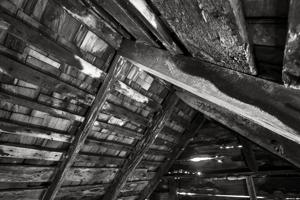 Disperate sizes of rafters led to nailing this pair