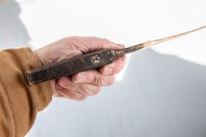 Early pry bar discovered in roof frame