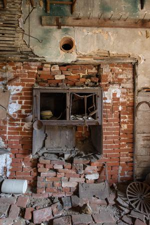 Cast-iron stove insert in kitchen, 1850s