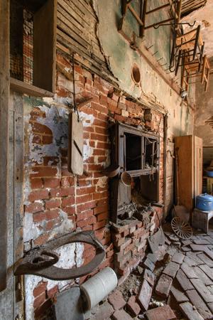 Kitchen with remains of early stove