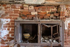 Cast-iron stove insert in kitchen, 1850s