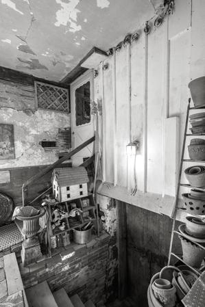 Bulkhead and stair from carriage room to house