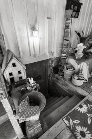 Carriage room, stair to cellar