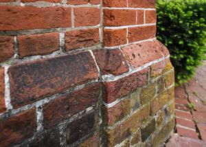 Water table brick cut to fit corner offset