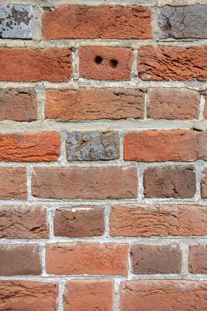 Intentional finger prints in brick