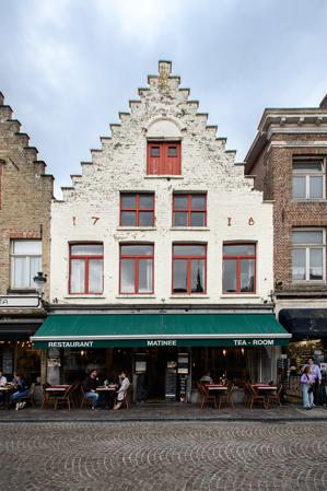 Facade held on with brick ties dated 1716