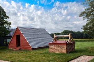 Reconstructed ice house and well head