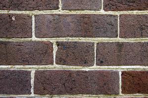 Ruled joints; bricks with iron inclusions