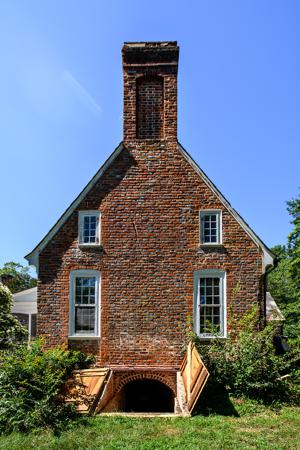 Gable end of original wing as bricked up about 1730