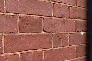Oil-stock brick, some faces rubbed; ruled joints, red wash on fr